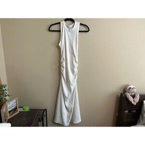 A new day cream, small cinched, ribbed dress